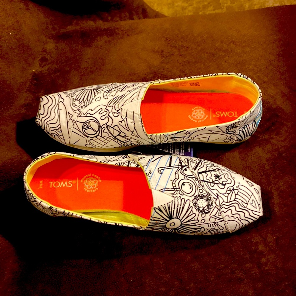 Toms  size 5.5, coloring book print. Never worn